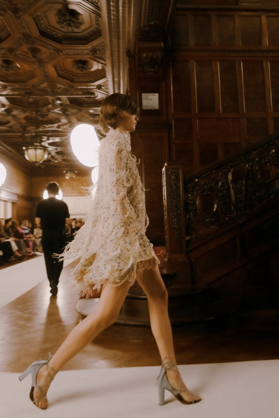 Miriam Dress with Feather Embroidery Walking the SS26 Runway - Side Motion Shot | Ulla Johnson