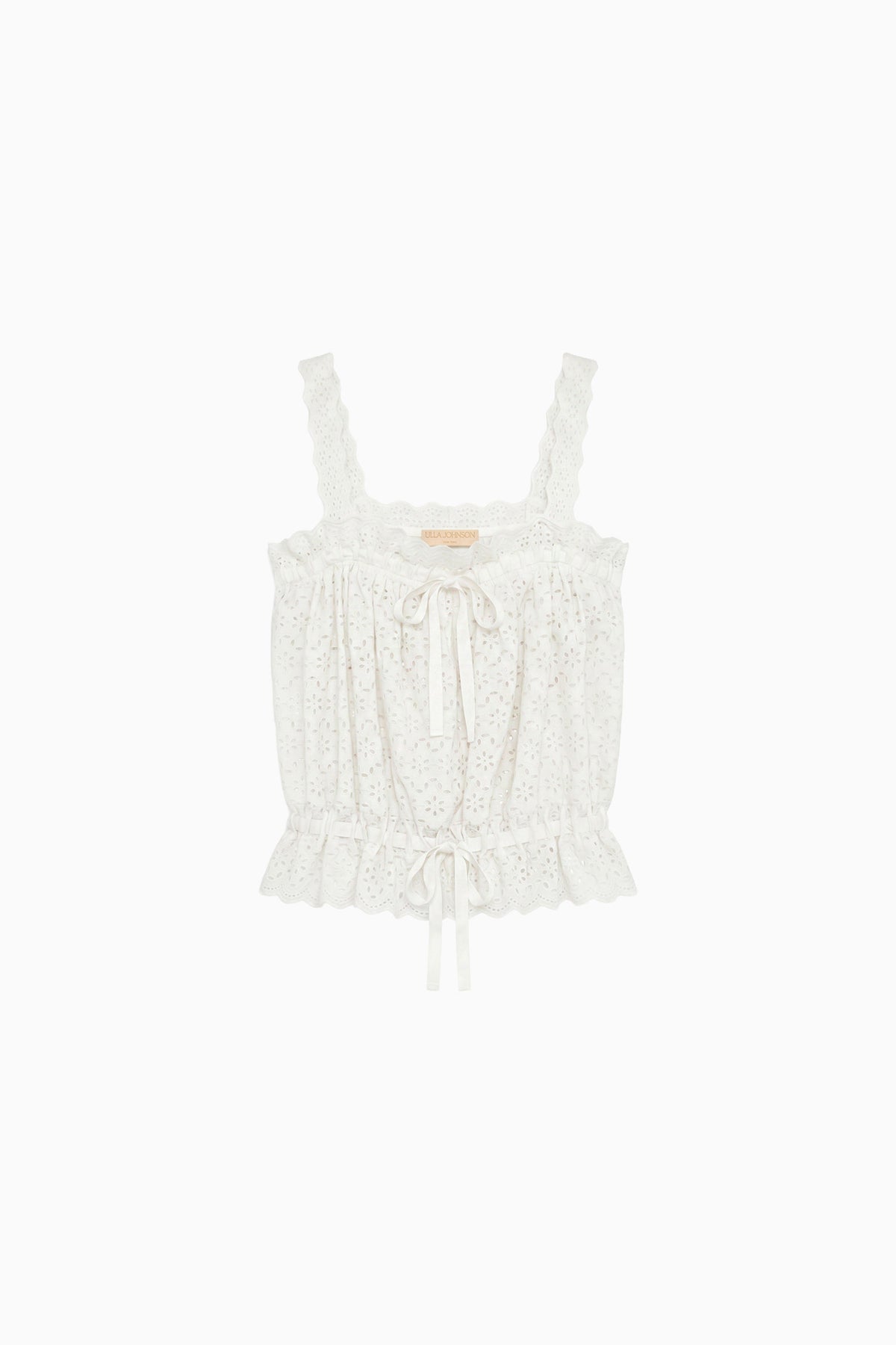 Top en coton blanc Pristine de créateur à œillets - Vue à plat avec liens en ruban et ourlet à volants | Ulla Johnson
