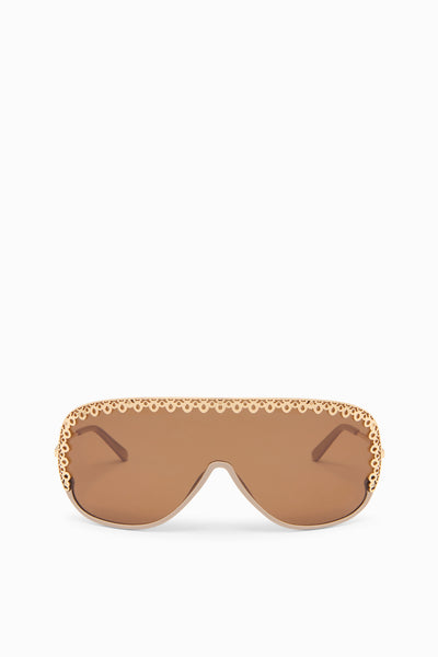 Lunettes de soleil Fawn en acétate forme bouclier avec garniture ornée dorée - Vue de face | Ulla Johnson