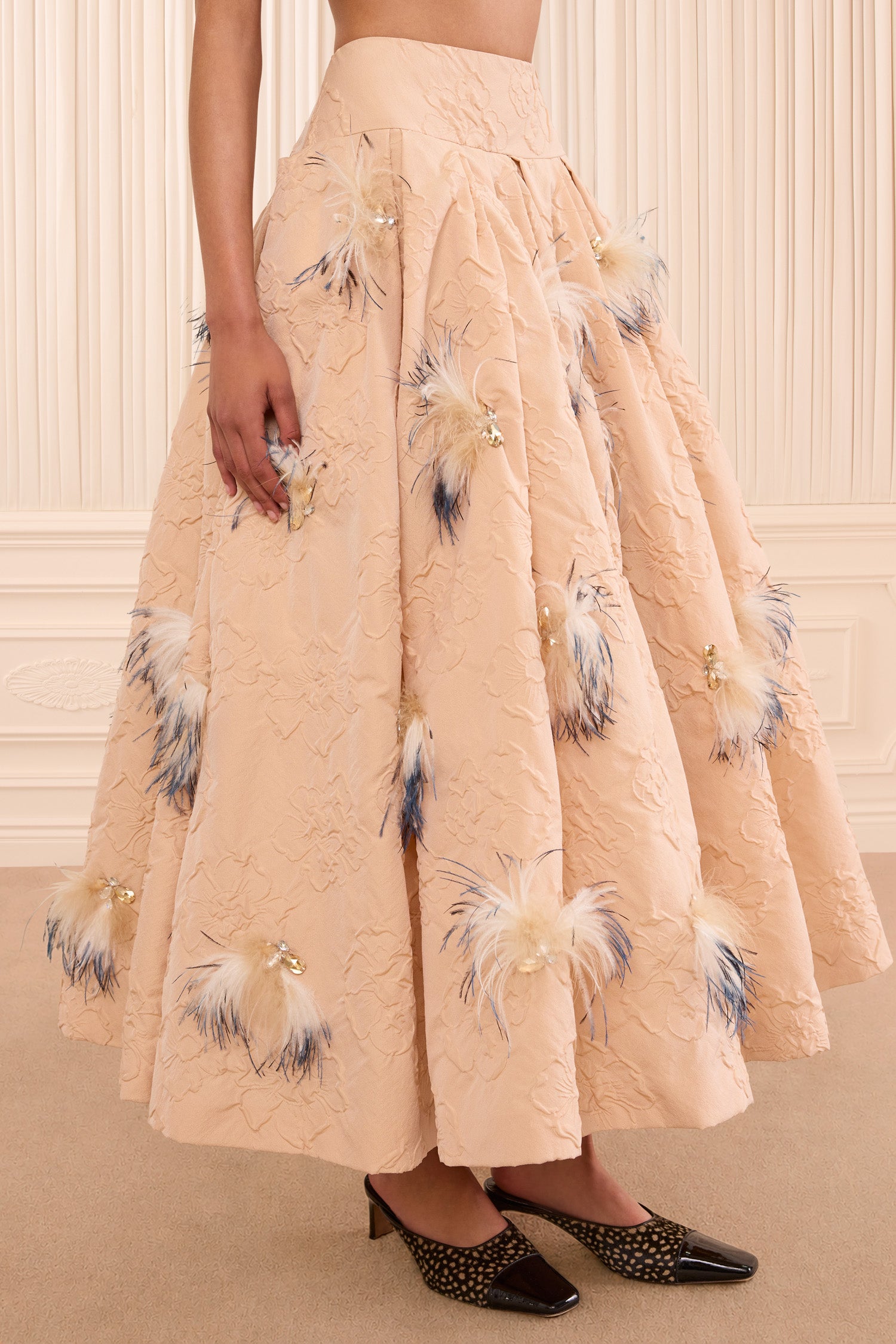 Ulla Johnson Almond Cloque Pleated Skirt - Hand-Applied Feather Embellishment Close-Up, On Model | Ulla Johnson