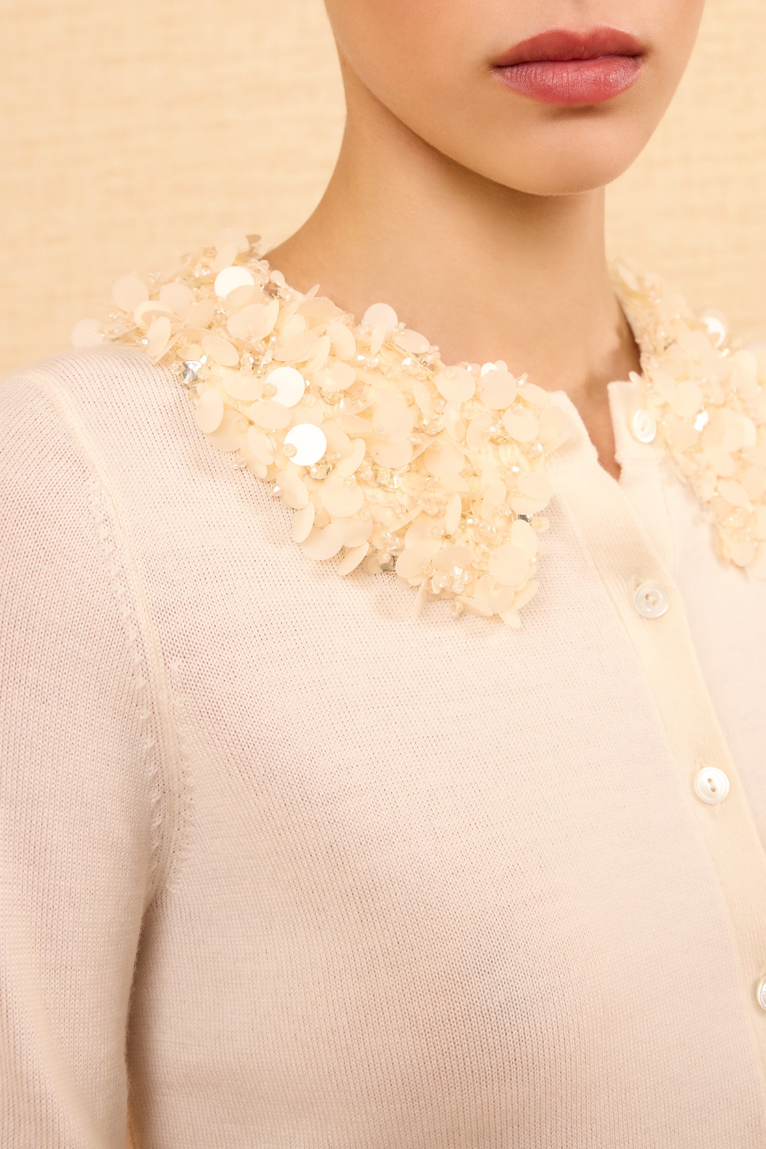 Ulla Johnson Pearl Sequin Collar Embellishment Close-Up Detail on Ivory Merino Wool Cardigan | Ulla Johnson