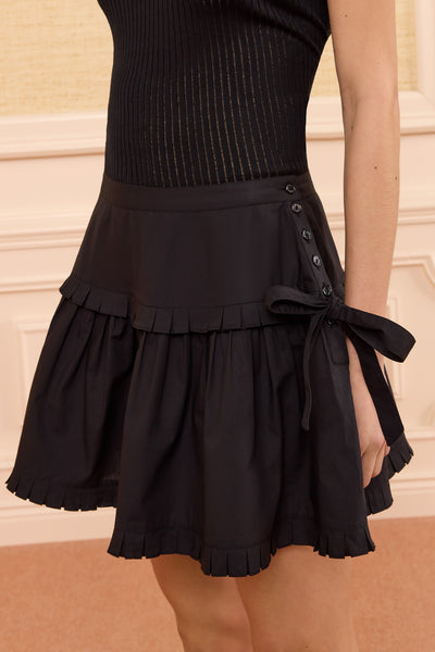Mini-jupe en coton de luxe Noir - Détail Volants Superposés & Fermeture Boutonnée | Ulla Johnson
