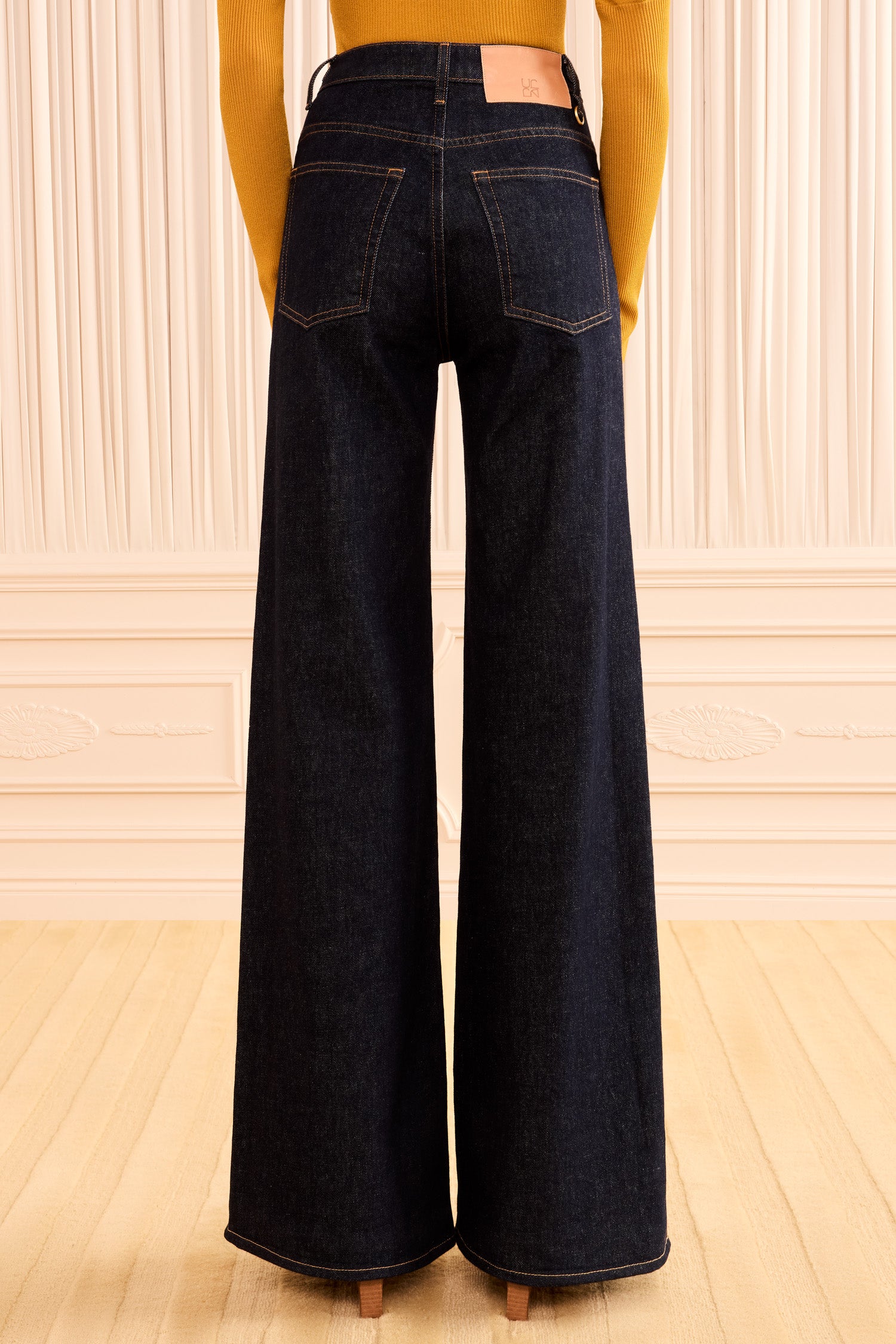 Ulla Johnson Tigris Dark Wash Denim Flared Jean, Back View On Model | Ulla Johnson