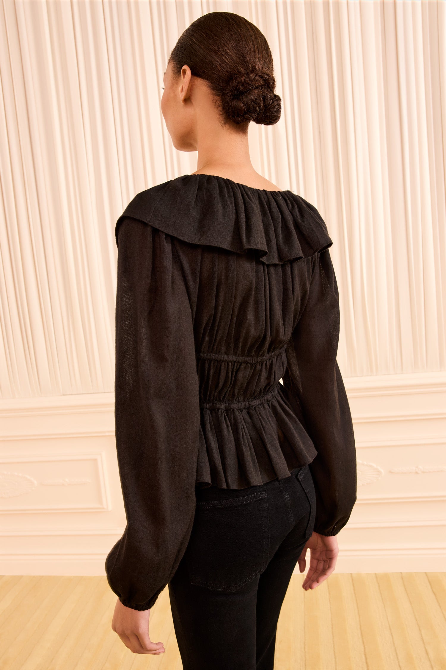 Ulla Johnson Noir Cotton Wool Blend Peplum Top - Back View On Model | Ulla Johnson