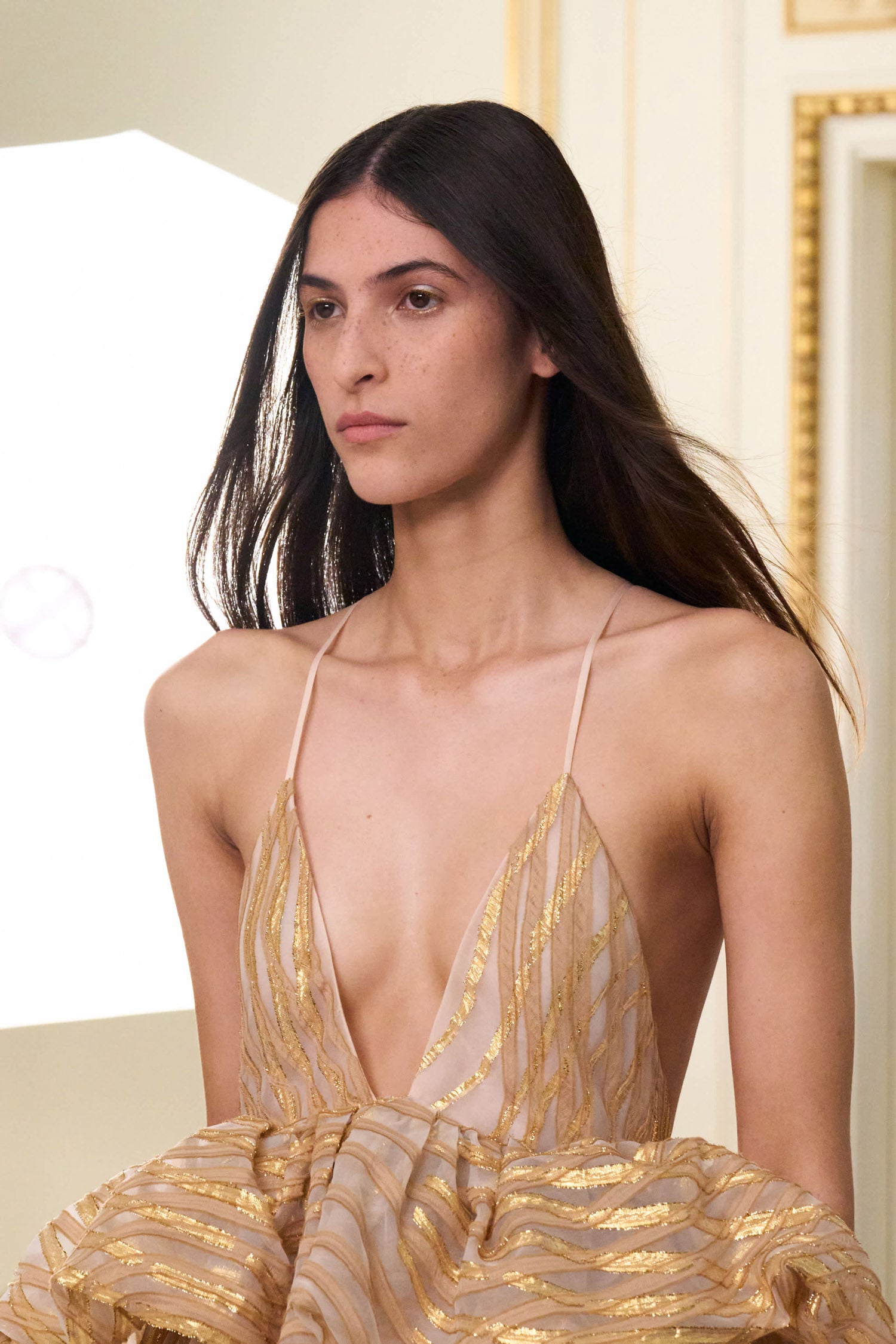 Ulla Johnson Gold Lurex Camelia Gown - Deep V-Neckline Close-Up, SS26 Runway | Ulla Johnson