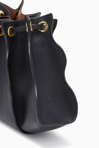 Black Leather Adria Wave Bag - Close-Up Hardware Detail Gold Grommets | Ulla Johnson