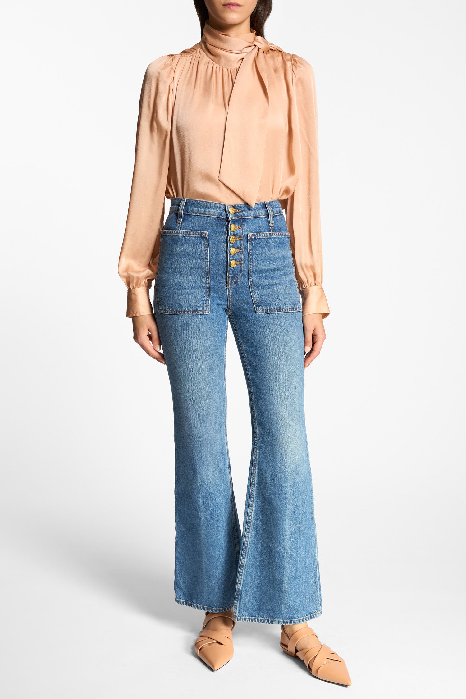 Ulla Johnson Blue Denim Lou Jean Flare Jeans with Patch Pockets - Front View On Model | Ulla Johnson