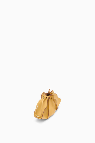 Lotus Yellow Leather Adria Wave Crossbody Bag - Bottom Angle View | Ulla Johnson