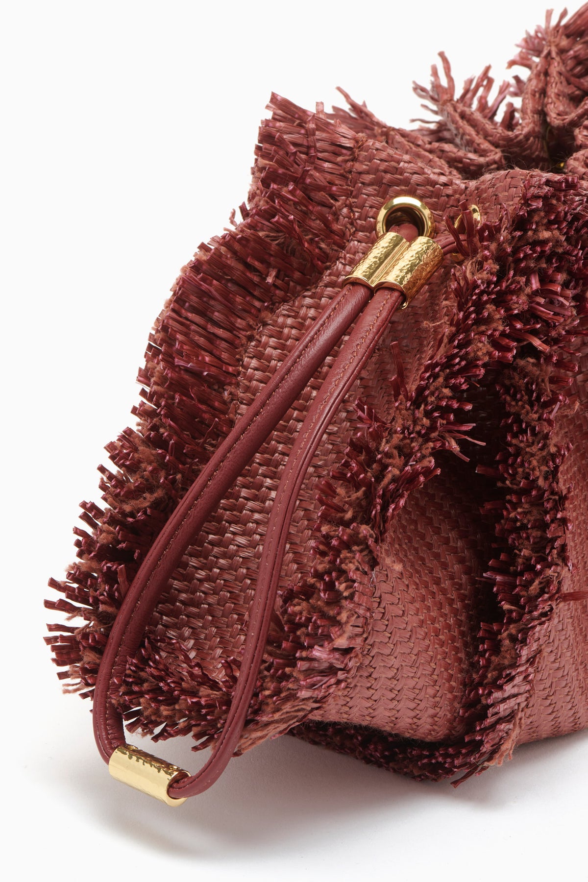 Acajou Raffia Adria Small Crossbody - Front View Styled as Wristlet | Ulla Johnson