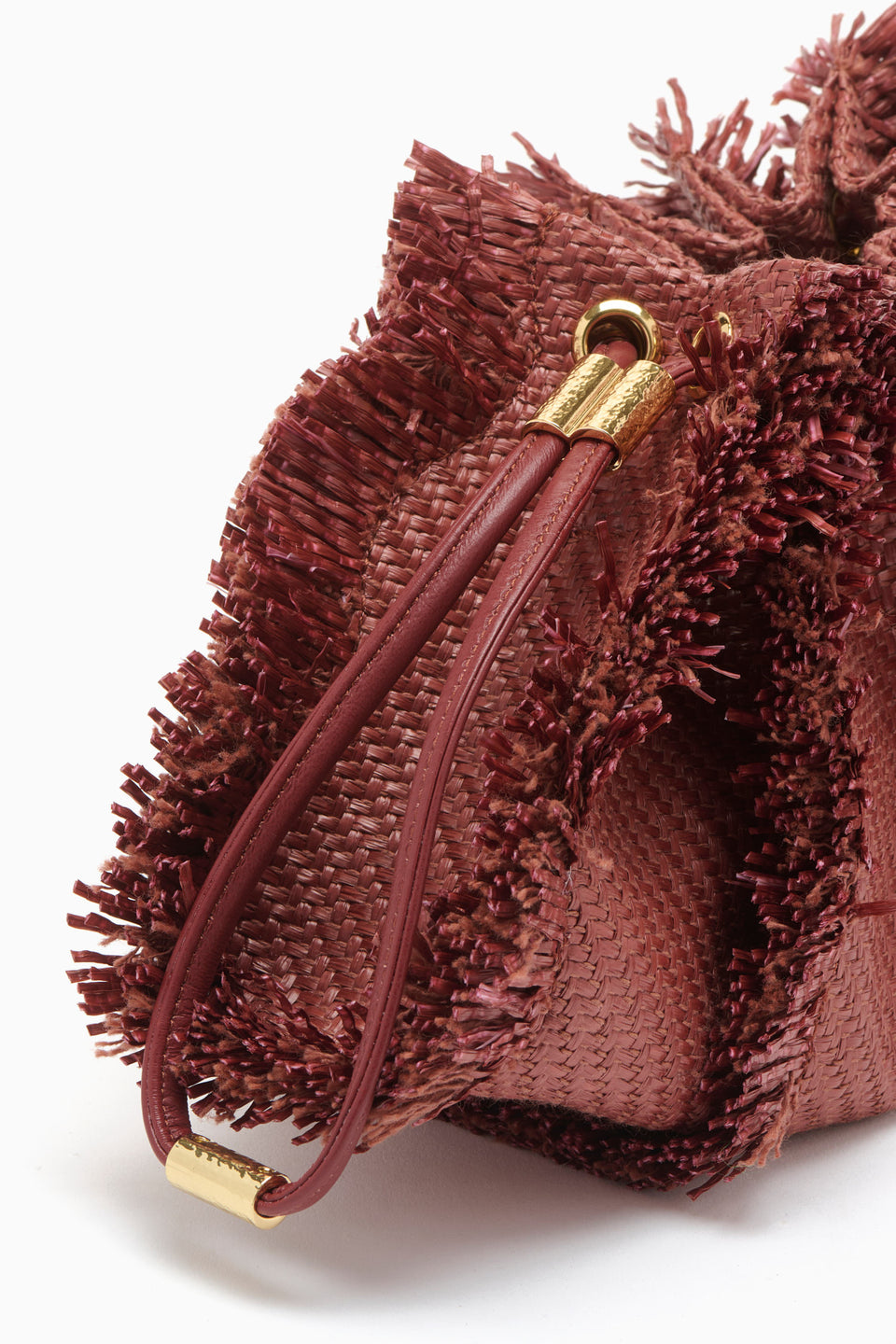 Acajou Raffia Adria Small Crossbody - Front View Styled as Wristlet | Ulla Johnson