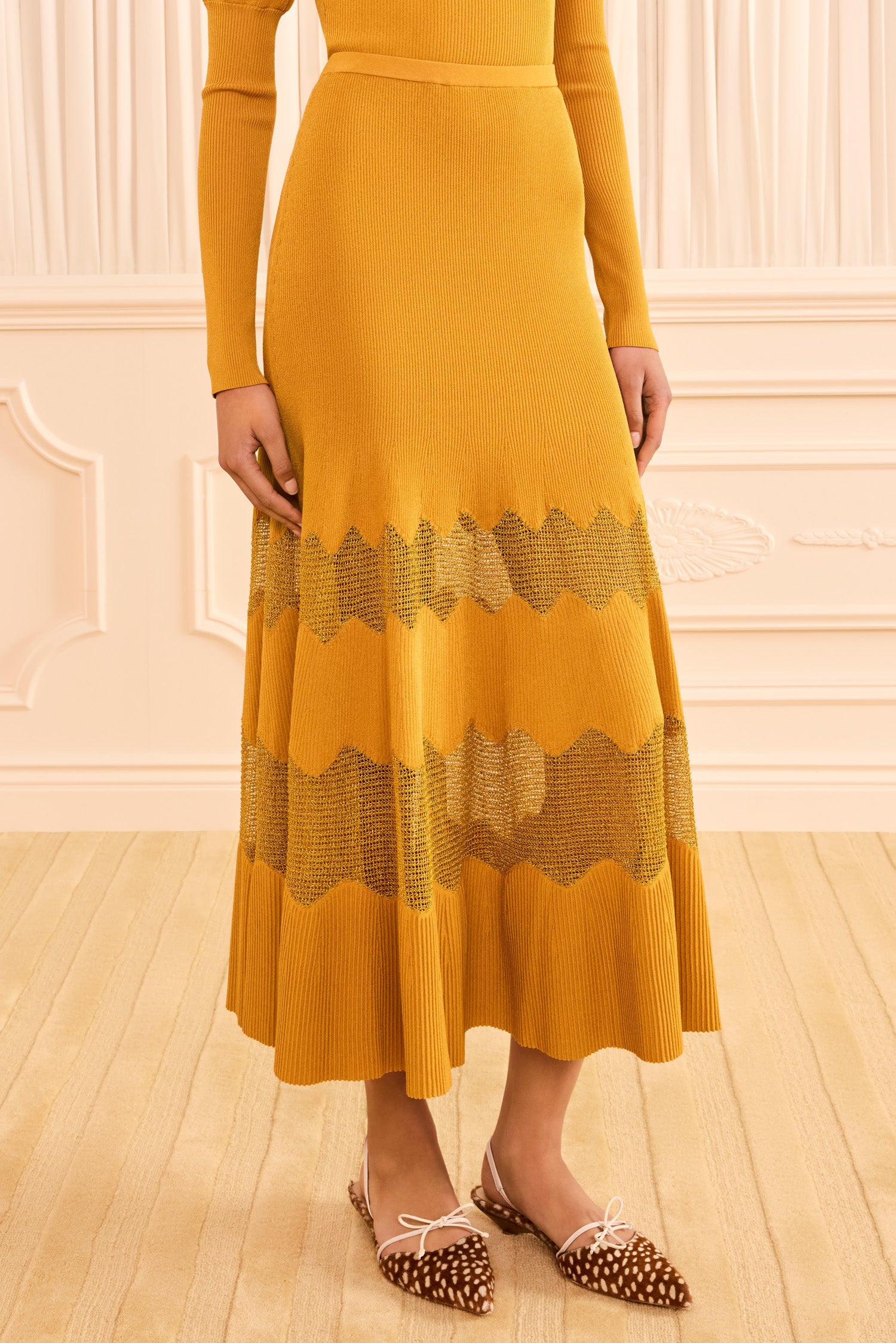 Ulla Johnson Topaz Gold Lurex Midi Knit Skirt - Wave Mesh Detail Close-Up On Model | Ulla Johnson