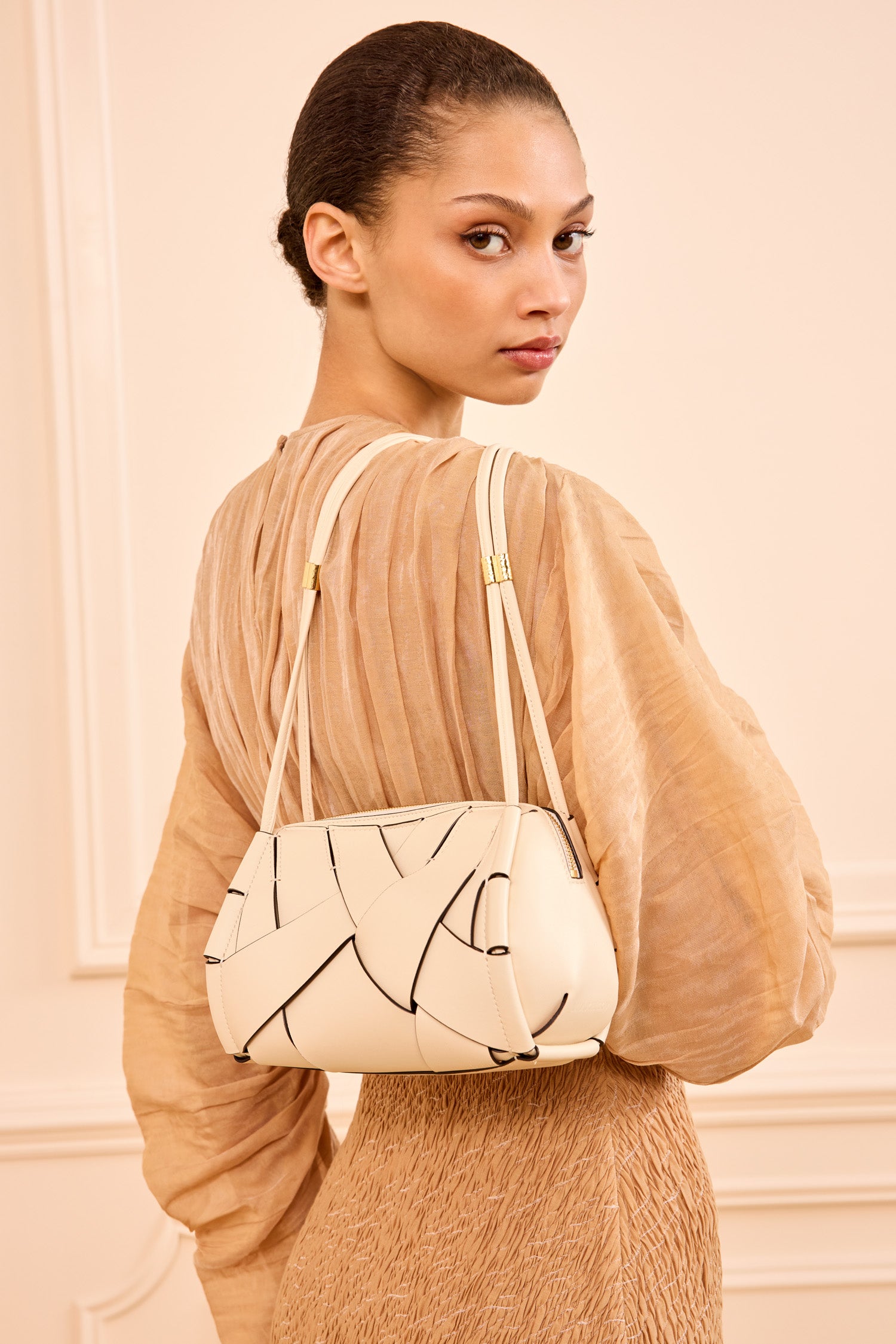 Ulla Johnson Model Wearing Cowrie Designer Charlotte Camera Crossbody Bag - On-Model Back View | Ulla Johnson
