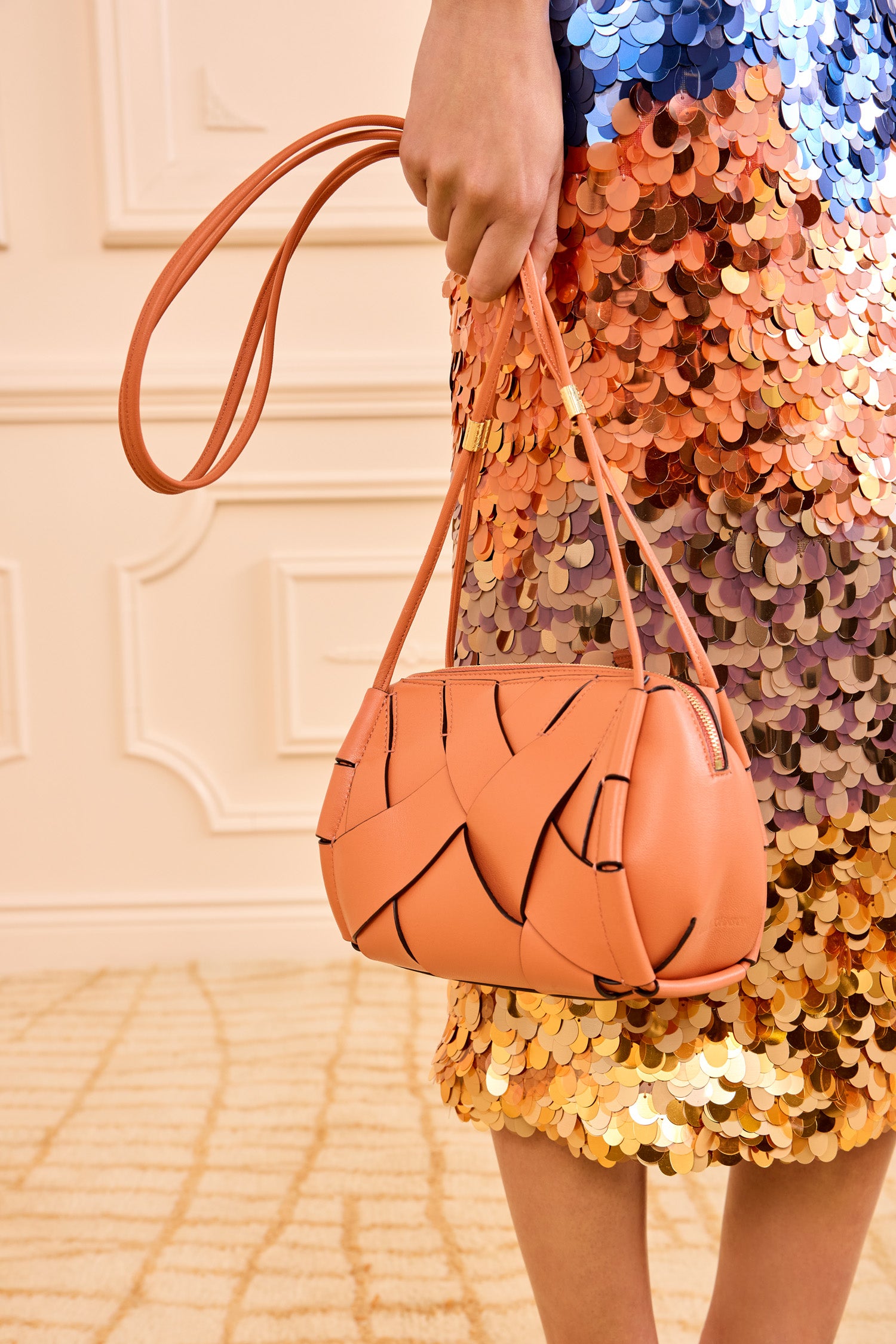 Ulla Johnson Designer Rose Woven Leather Charlotte Camera Bag Held by Model - Close Up | Ulla Johnson