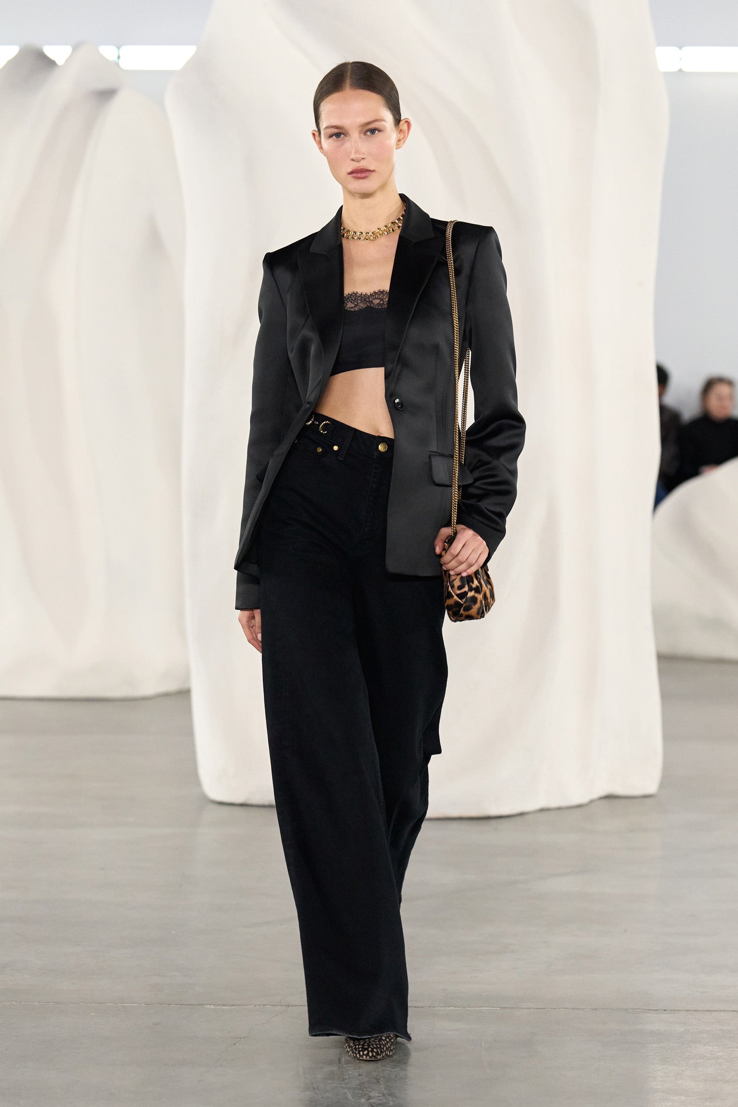 Ulla Johnson Ulla Johnson AW26 Runway Look 13 - Noir Flare Jean with Black Satin Blazer, Runway View | Ulla Johnson