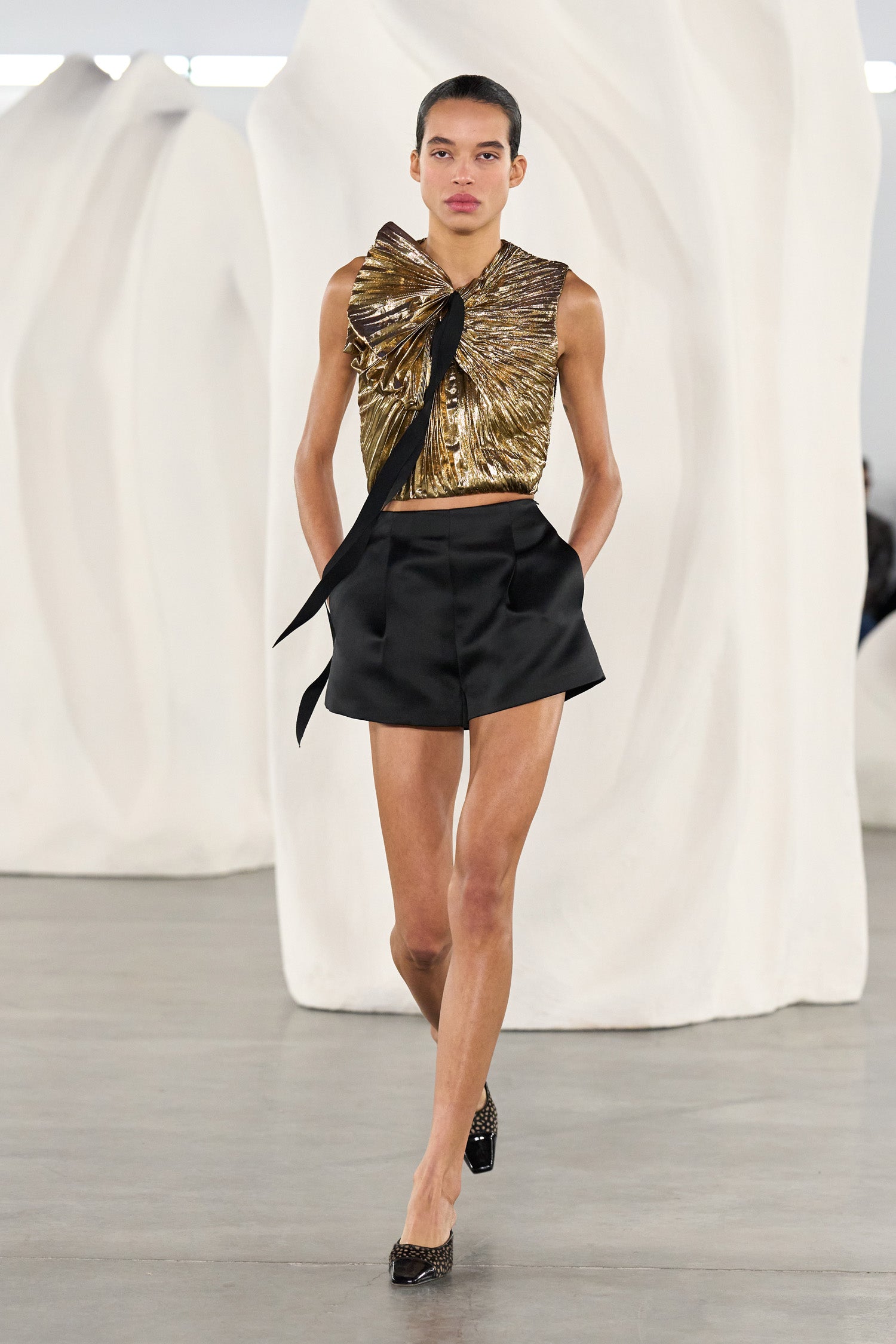 Ulla Johnson Noir Satin Mini Shorts on AW26 Runway, Look 22 - Full Length Walking | Ulla Johnson