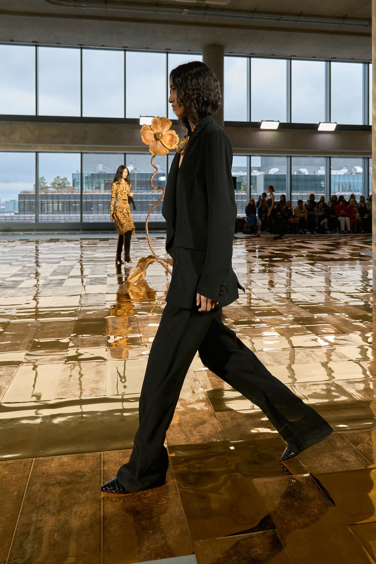 Black Designer Suit - Runway Model Walking Side Profile | Ulla Johnson